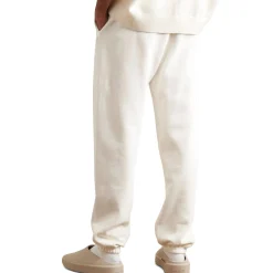 Fear Of God Essentials Cloud Dancer Sweatpants (FW23)< Bottoms|Matching Sets