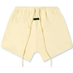 Fear Of God Essentials Garden Yellow Shorts (FW23)< Shorts|Matching Sets
