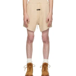 Fear Of God Essentials Gold Heather Shorts (FW23)< Shorts|Matching Sets