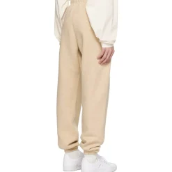Fear Of God Essentials Gold Heather Sweatpants (FW23)< Bottoms|Matching Sets