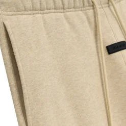 Fear Of God Essentials Gold Heather Sweatpants (FW23)< Bottoms|Matching Sets