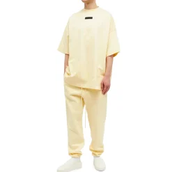 Fear Of God Essentials SS Garden Yellow T Shirt (FW23)< Matching Sets|T-shirts