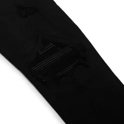 Amiri Preloved - MX1 Black Patch Jeans< Jeans|Bottoms